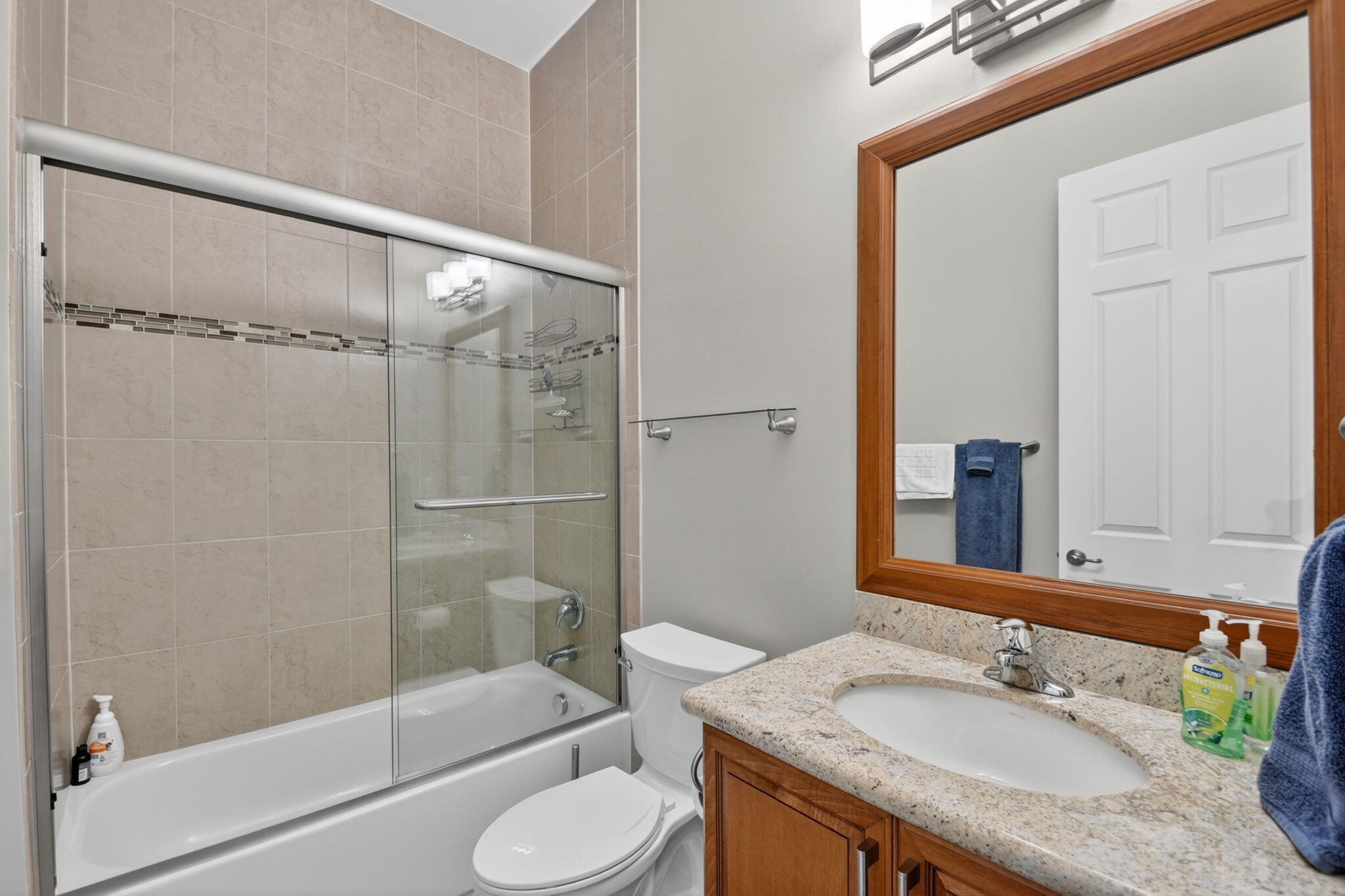 9119 Ribbons Ridge Point Boynton Beach, FL 33473 - Photo 36 of 91 a bathroom with a granite countertop sink toilet and shower