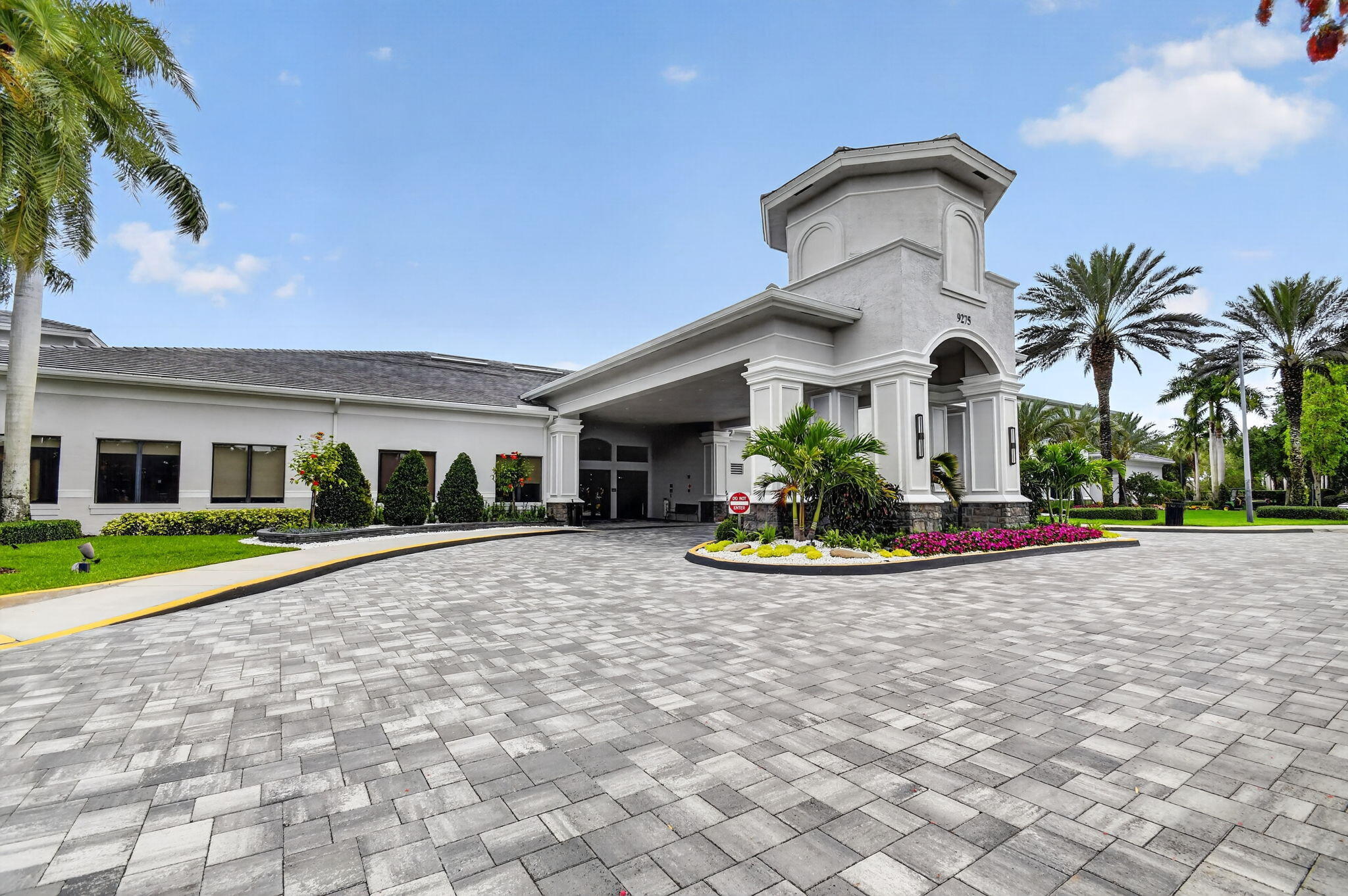 9119 Ribbons Ridge Point Boynton Beach, FL 33473 - Photo 61 of 91 a view of a white house with a big yard and large trees