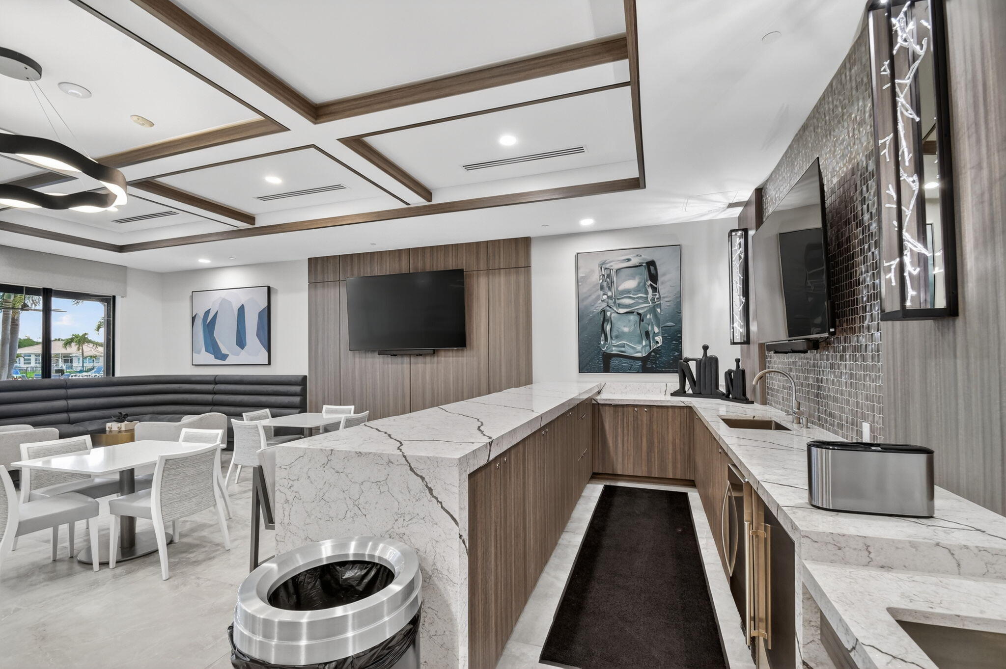 9119 Ribbons Ridge Point Boynton Beach, FL 33473 - Photo 69 of 91 a living room with stainless steel appliances furniture a fireplace and a flat screen tv