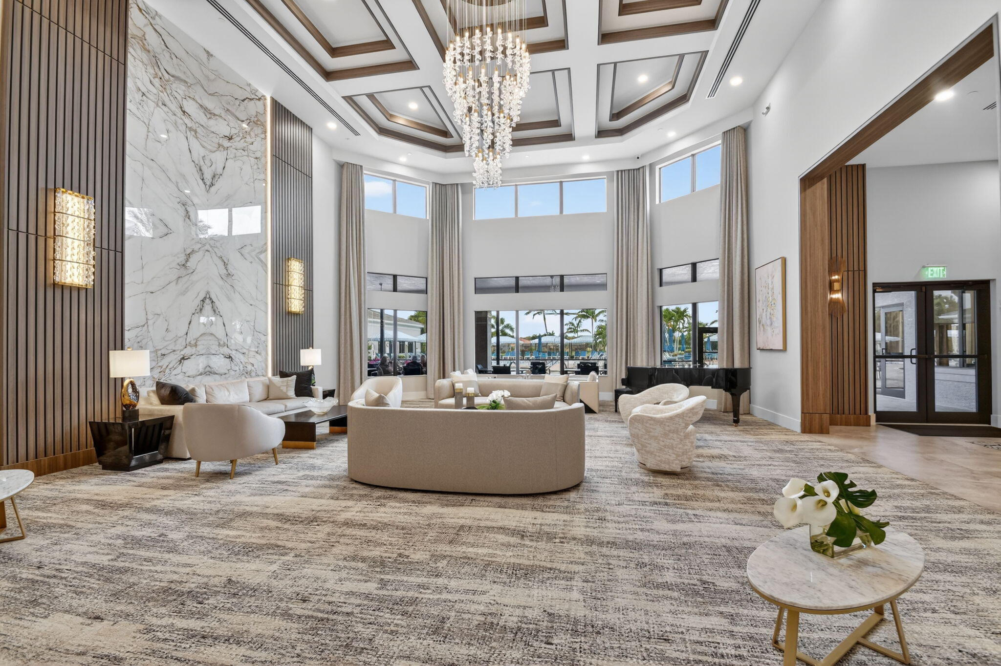 9119 Ribbons Ridge Point Boynton Beach, FL 33473 - Photo 71 of 91 a living room with furniture and a chandelier