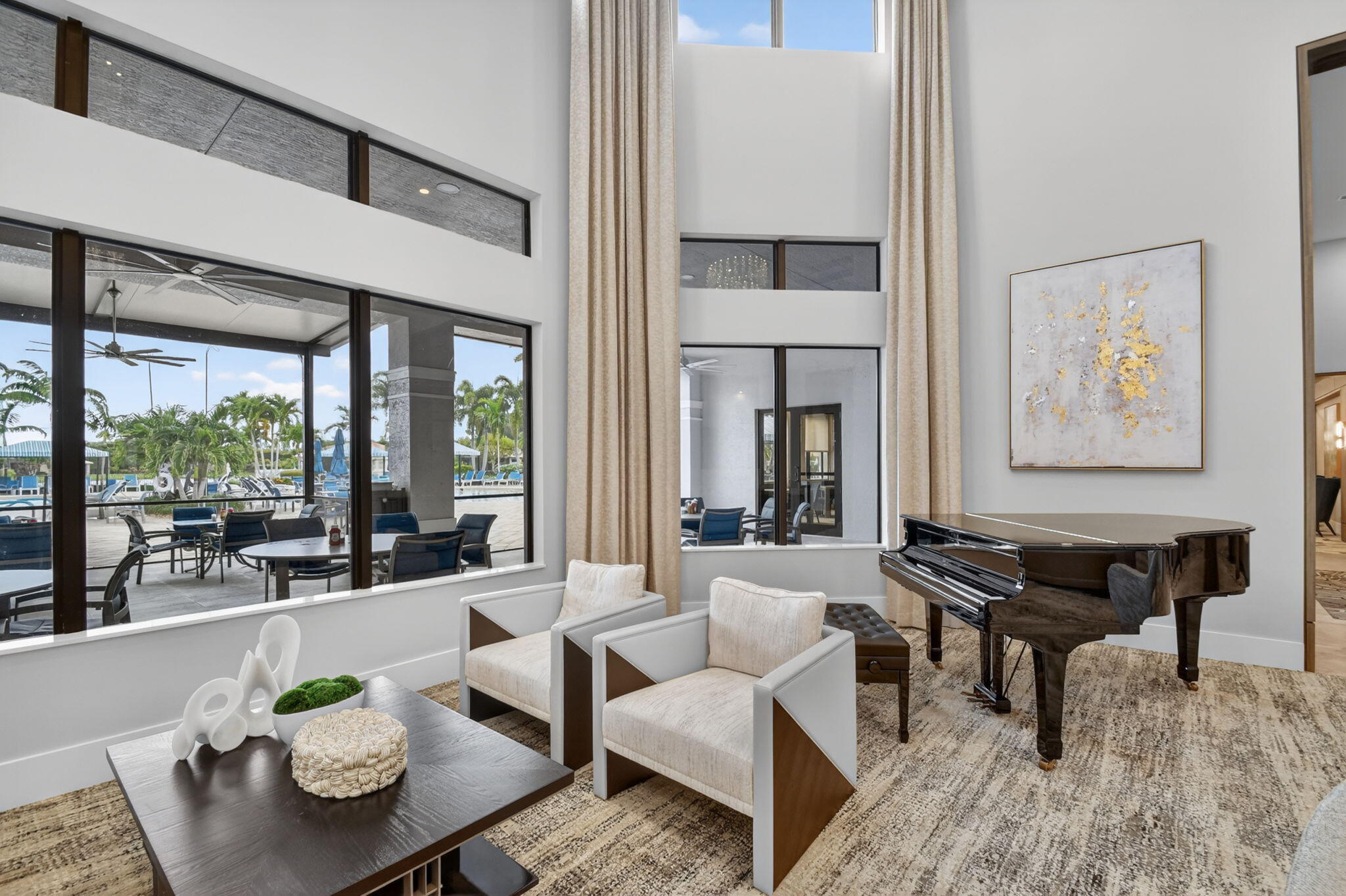 9119 Ribbons Ridge Point Boynton Beach, FL 33473 - Photo 73 of 91 a living room with furniture and a large window