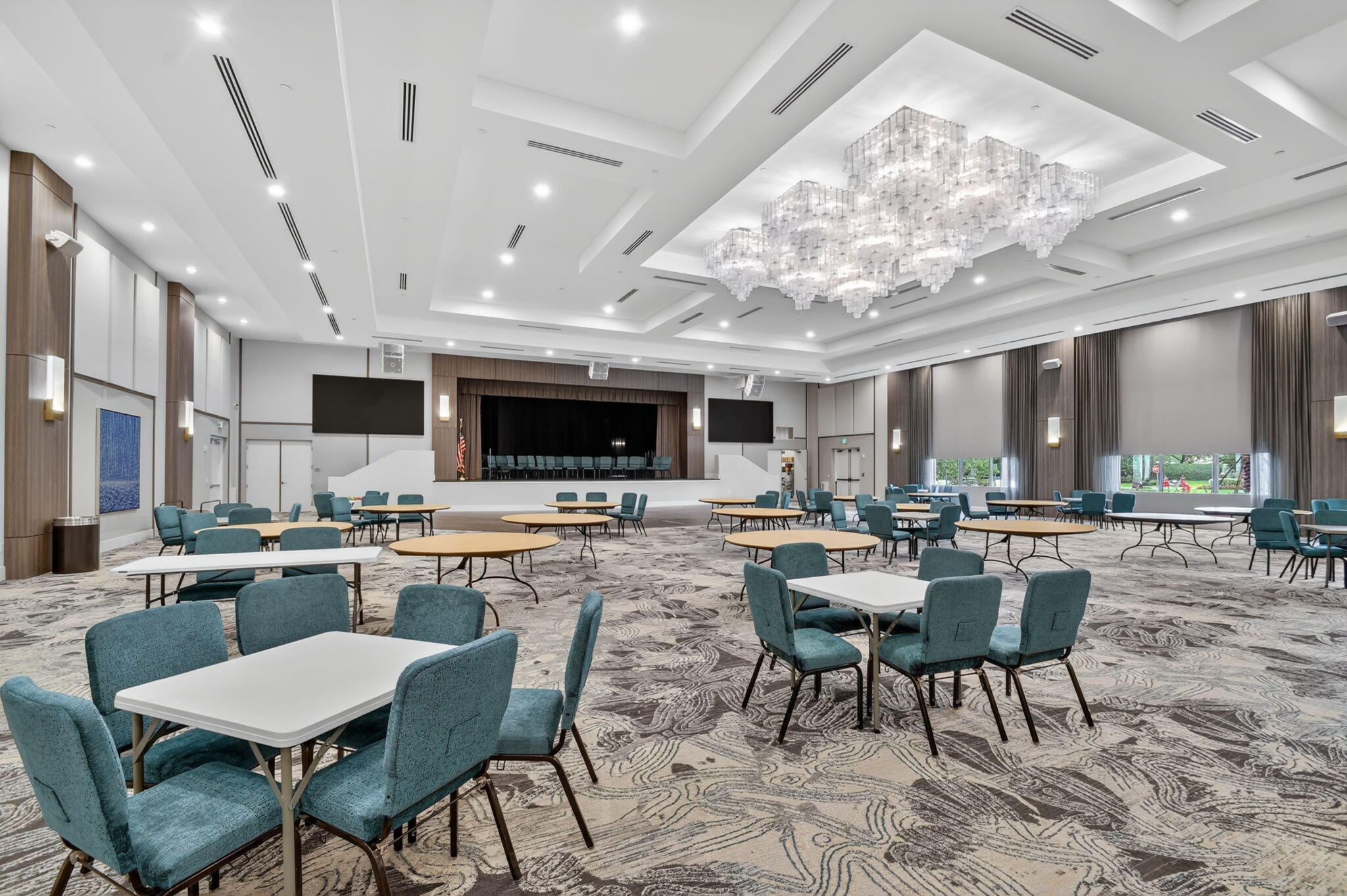 9119 Ribbons Ridge Point Boynton Beach, FL 33473 - Photo 79 of 91 a view of a dining room with furniture a kitchen and chandelier