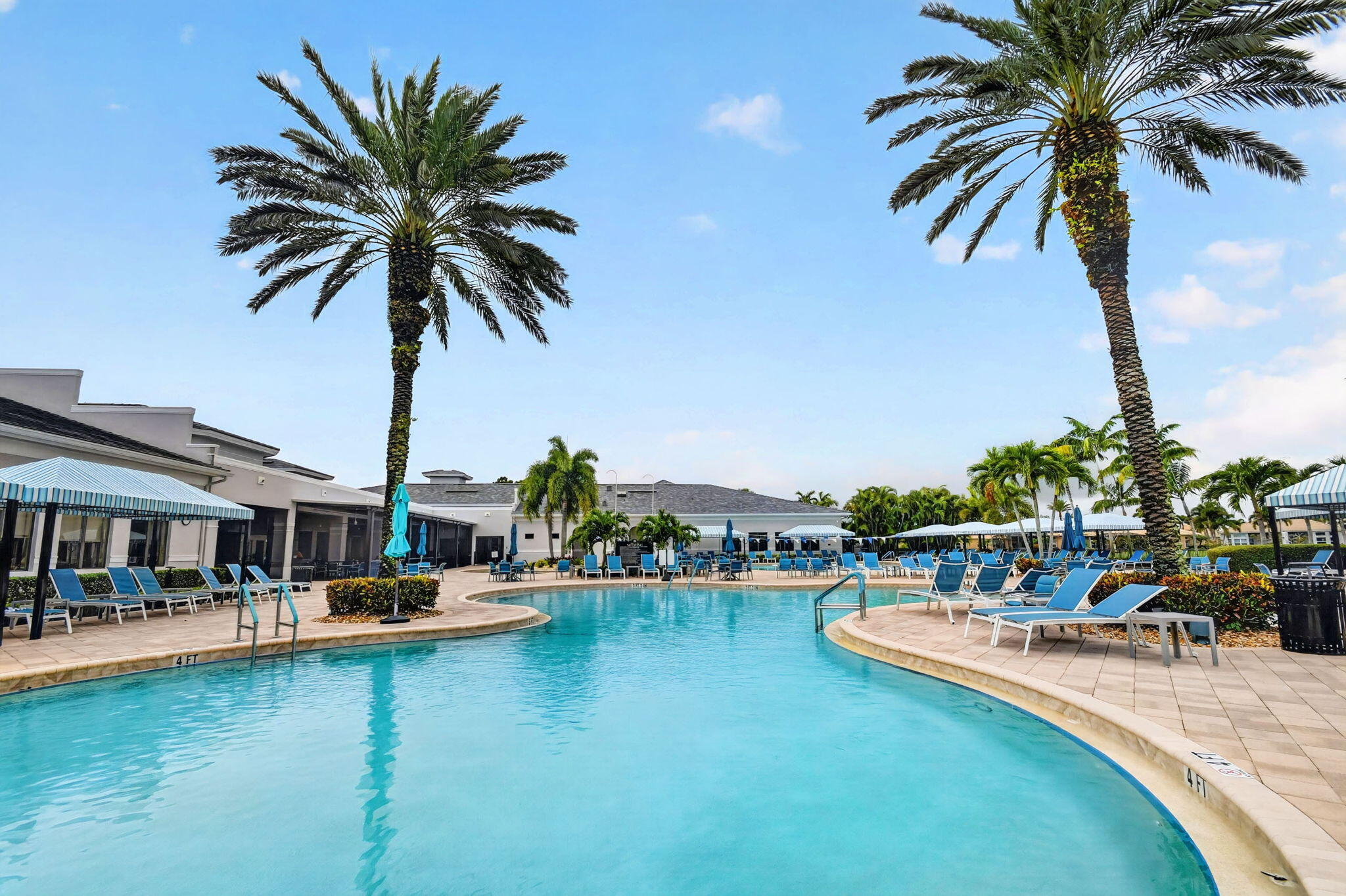 9119 Ribbons Ridge Point Boynton Beach, FL 33473 - Photo 83 of 91 a view of swimming pool with outdoor seating and a garden