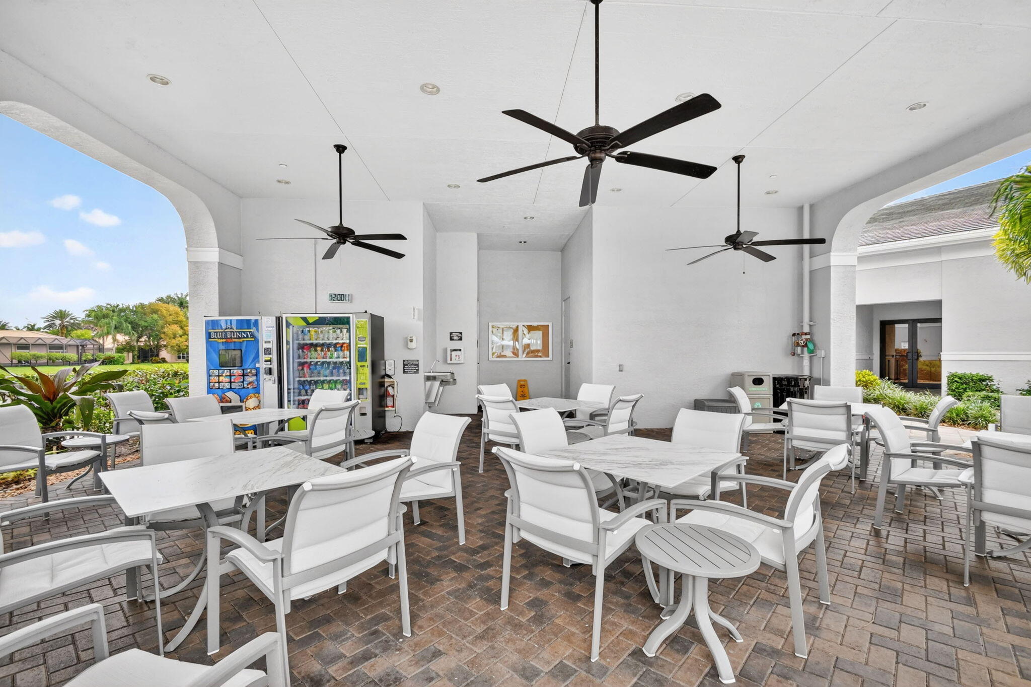9119 Ribbons Ridge Point Boynton Beach, FL 33473 - Photo 87 of 91 a view of a dining room with furniture window and wooden floor
