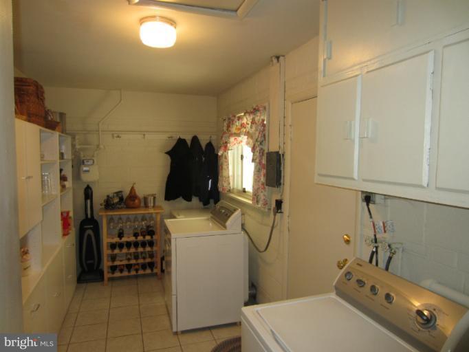 7406 Axton Street Springfield, VA 22151 - Photo 21 of 30 Storage and Laundry Area w Washer and Dryer