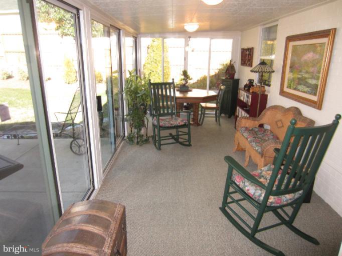 7406 Axton Street Springfield, VA 22151 - Photo 4 of 30 Pretty Sunroom Addition with Sliding Glass Doors