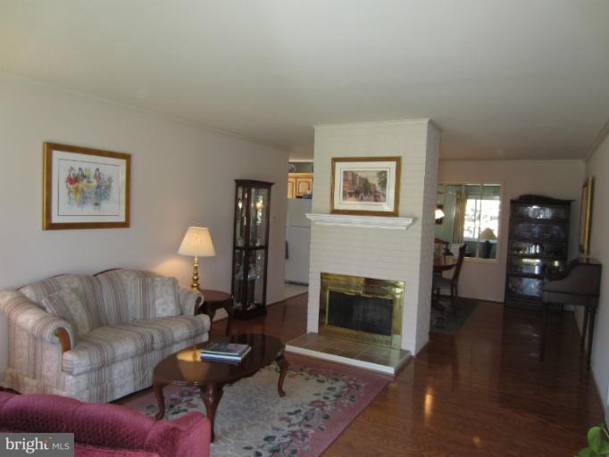 7406 Axton Street Springfield, VA 22151 - Photo 5 of 30 Wood Floors grace the Formal Living/Dining Area