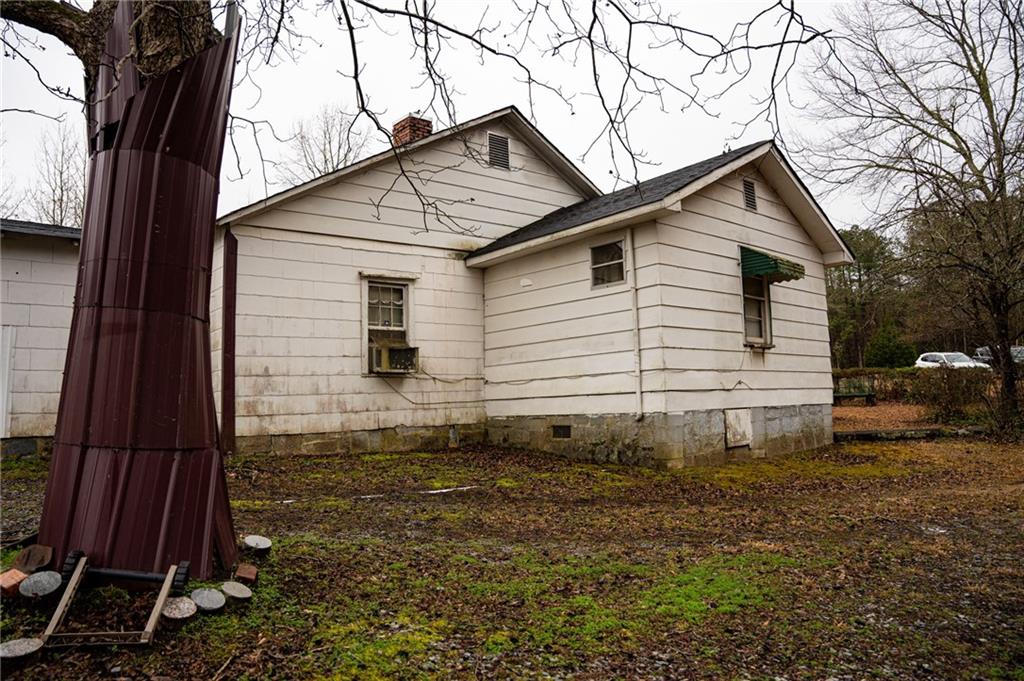1702 Jones Ferry Road Elberton, GA 30635 - Photo 7 of 21 a view of a house with backyard