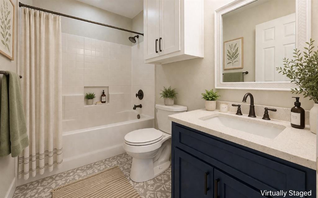 142 Tomahawk Drive Waco, TX 76705 - Photo 11 of 14 a bathroom with a sink a toilet a mirror and shower