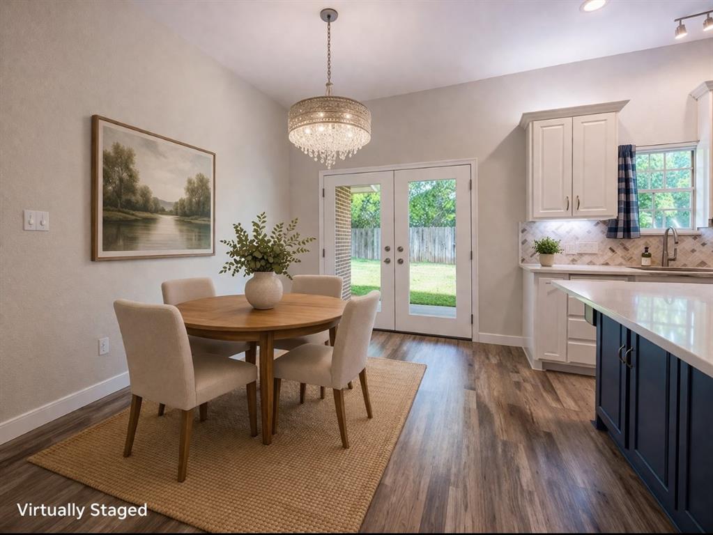 142 Tomahawk Drive Waco, TX 76705 - Photo 3 of 14 a view of a dining room with furniture window and wooden floor