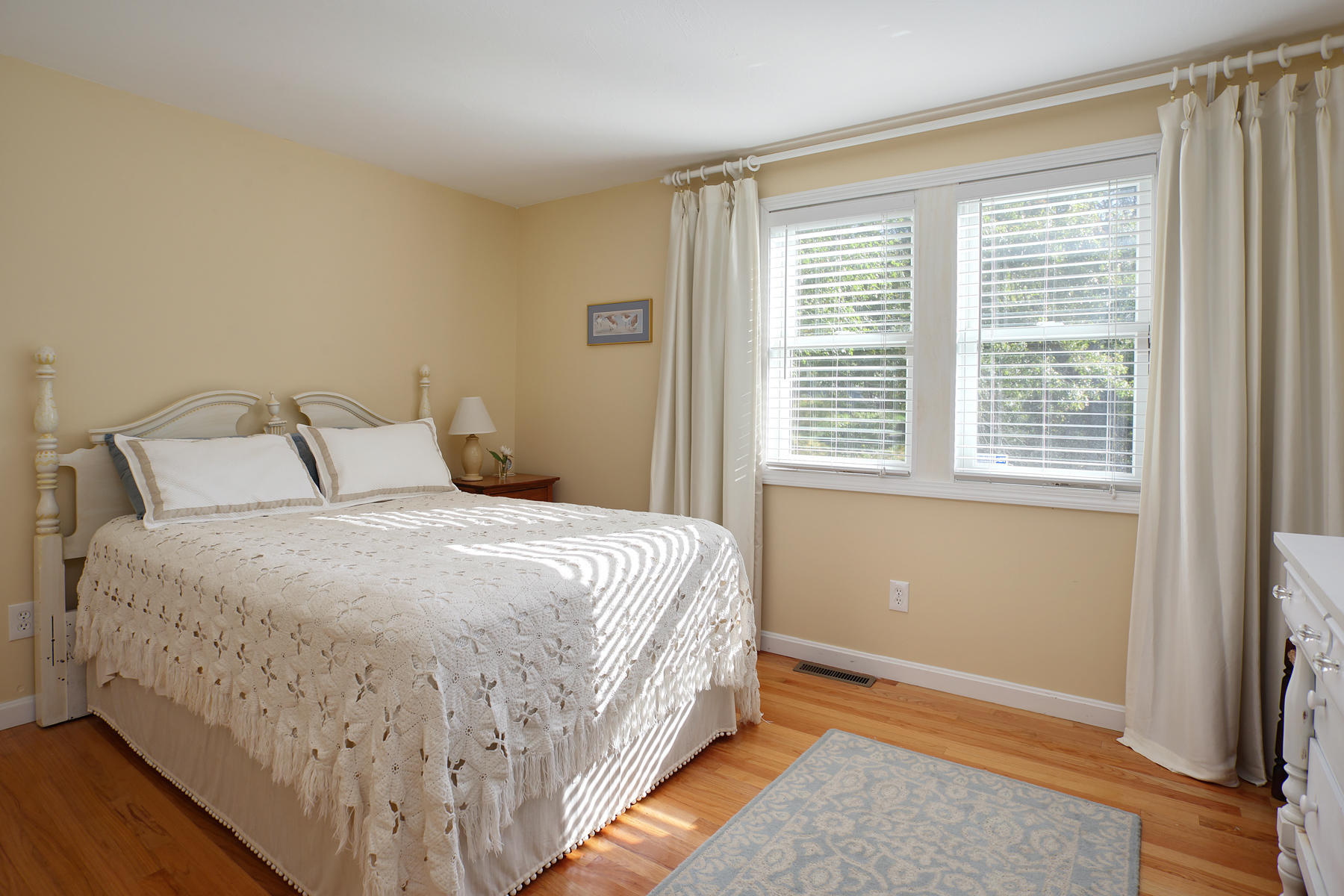 132 Harbor Hills Road Centerville, MA 02632 - Photo 11 of 31 a bedroom with a bed and next to a window