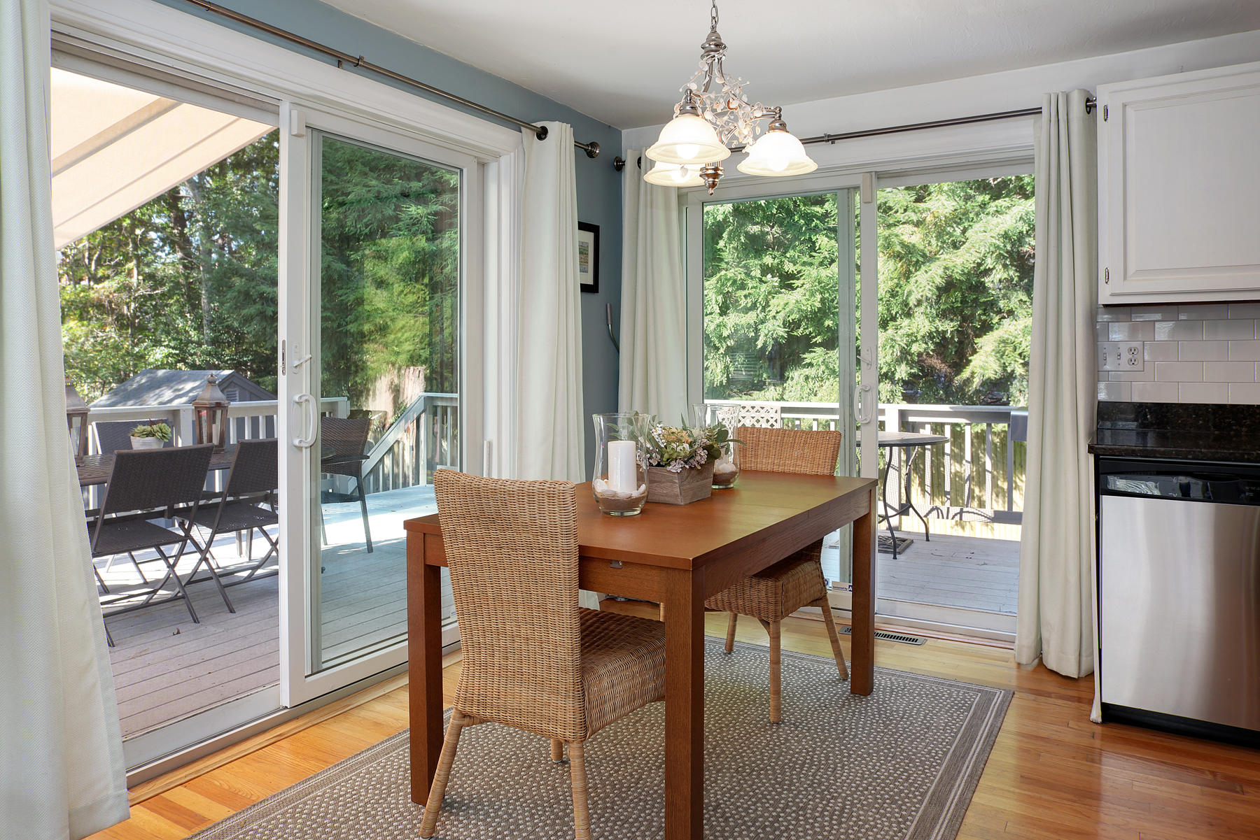 132 Harbor Hills Road Centerville, MA 02632 - Photo 6 of 31 a view of a dining room with furniture window and outside view