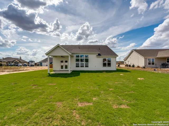 a view of a house with a big yard