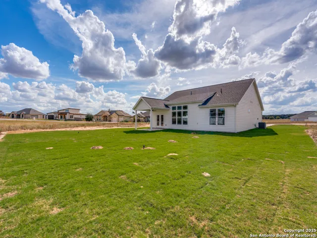 a view of a house with a big yard