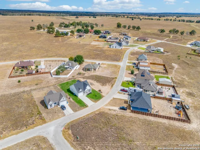 a view of living room with furniture and rug