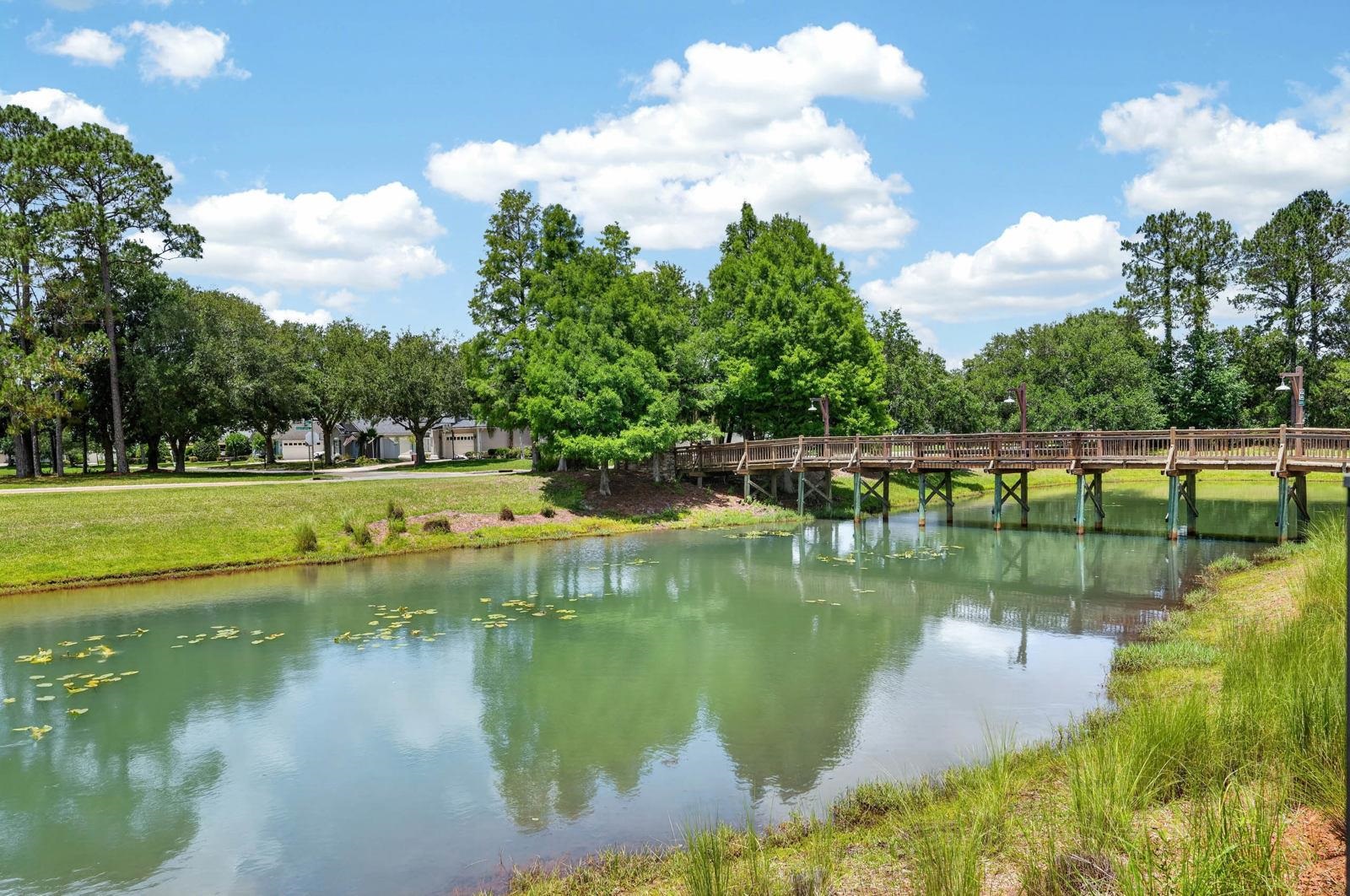 1237 Splendid Ravine Street St. Augustine, FL 32092 - Photo 58 of 62 a view of a lake with a yard