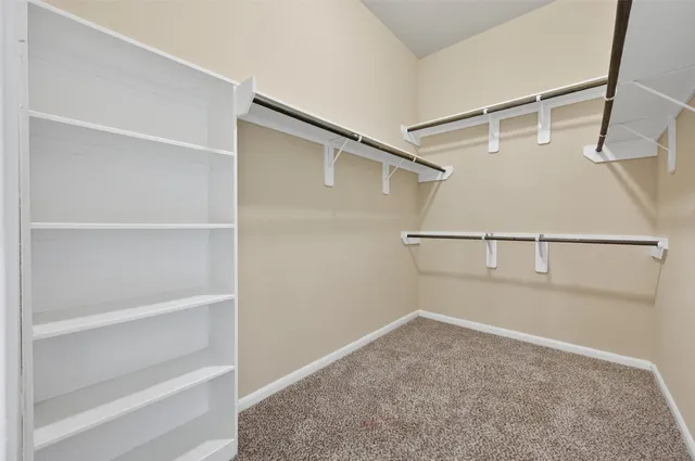 a view of a room that has a window in it