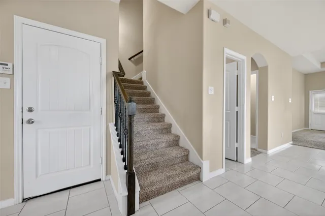 a view of empty room with fan