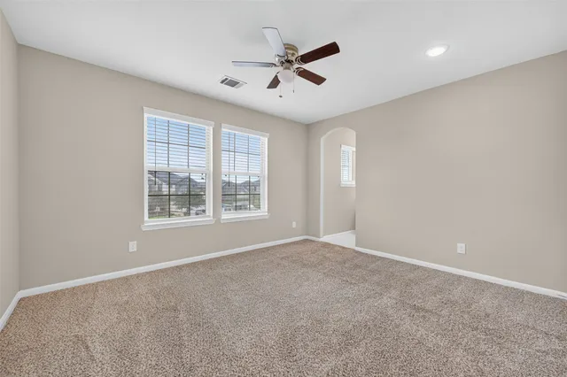 a bathroom with a sink a mirror and a window