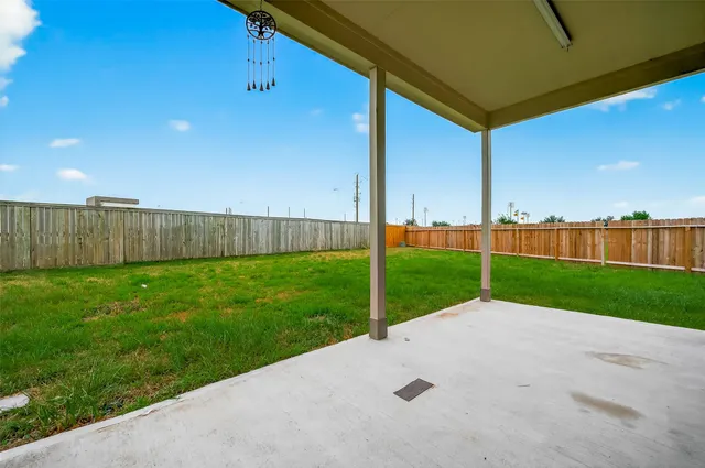 a view of a yard with an outdoor space