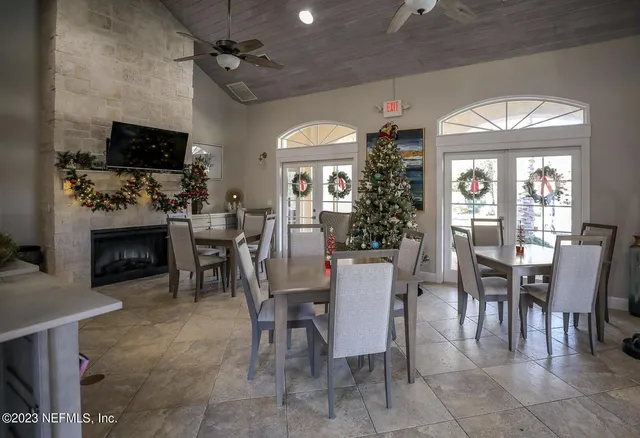a view of a livingroom with furniture window and fireplace