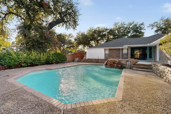 a view of a backyard with a garden