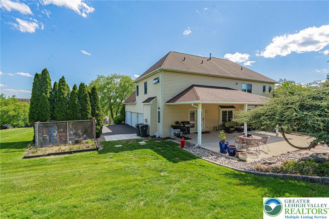 6551 Overlook Road Orefield, PA 18069 - Photo 66 of 82 a view of a house with backyard and sitting area