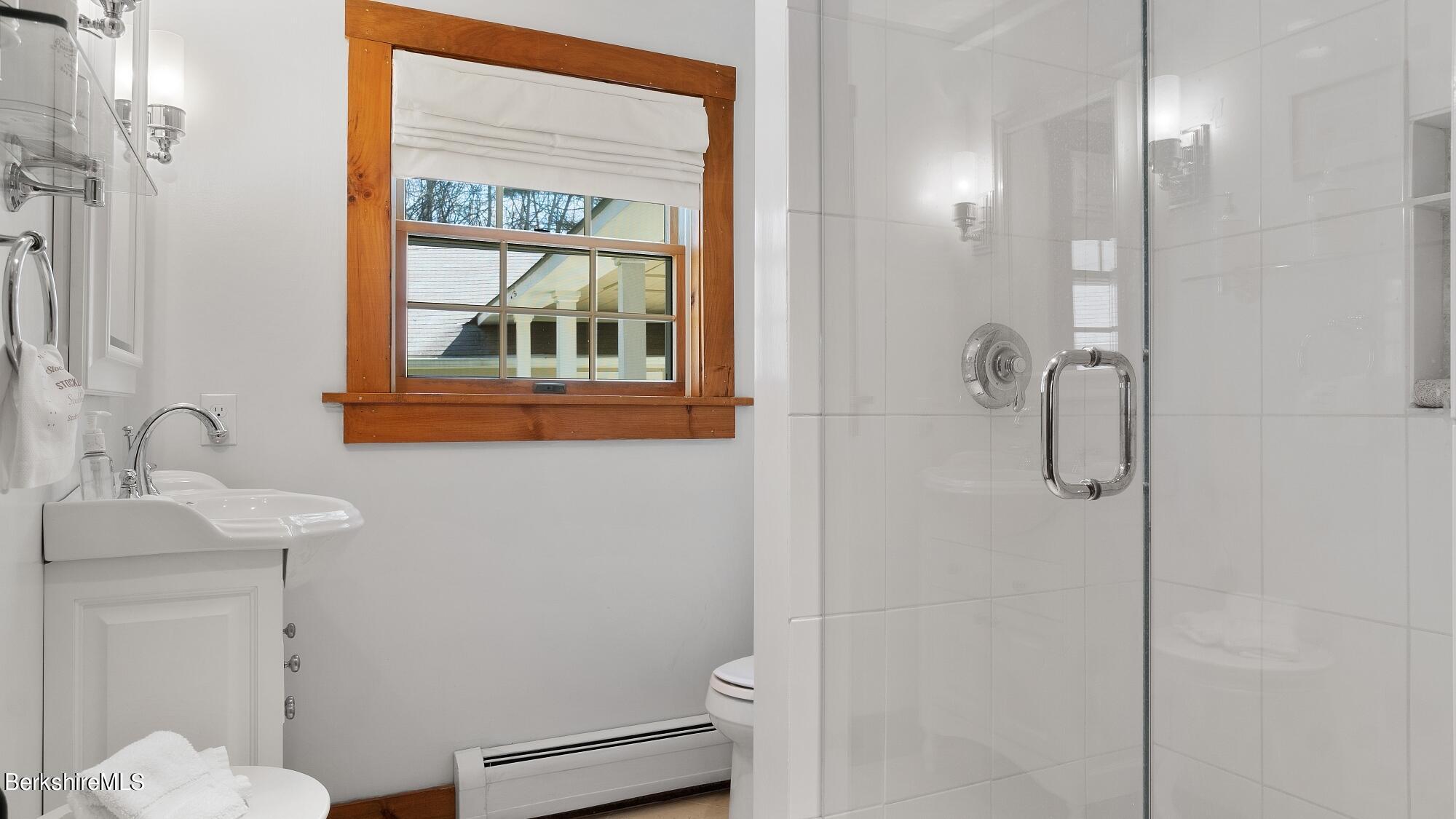 2 Hill Road Stockbridge, MA 01266 - Photo 12 of 24 a bathroom with a sink a toilet and shower