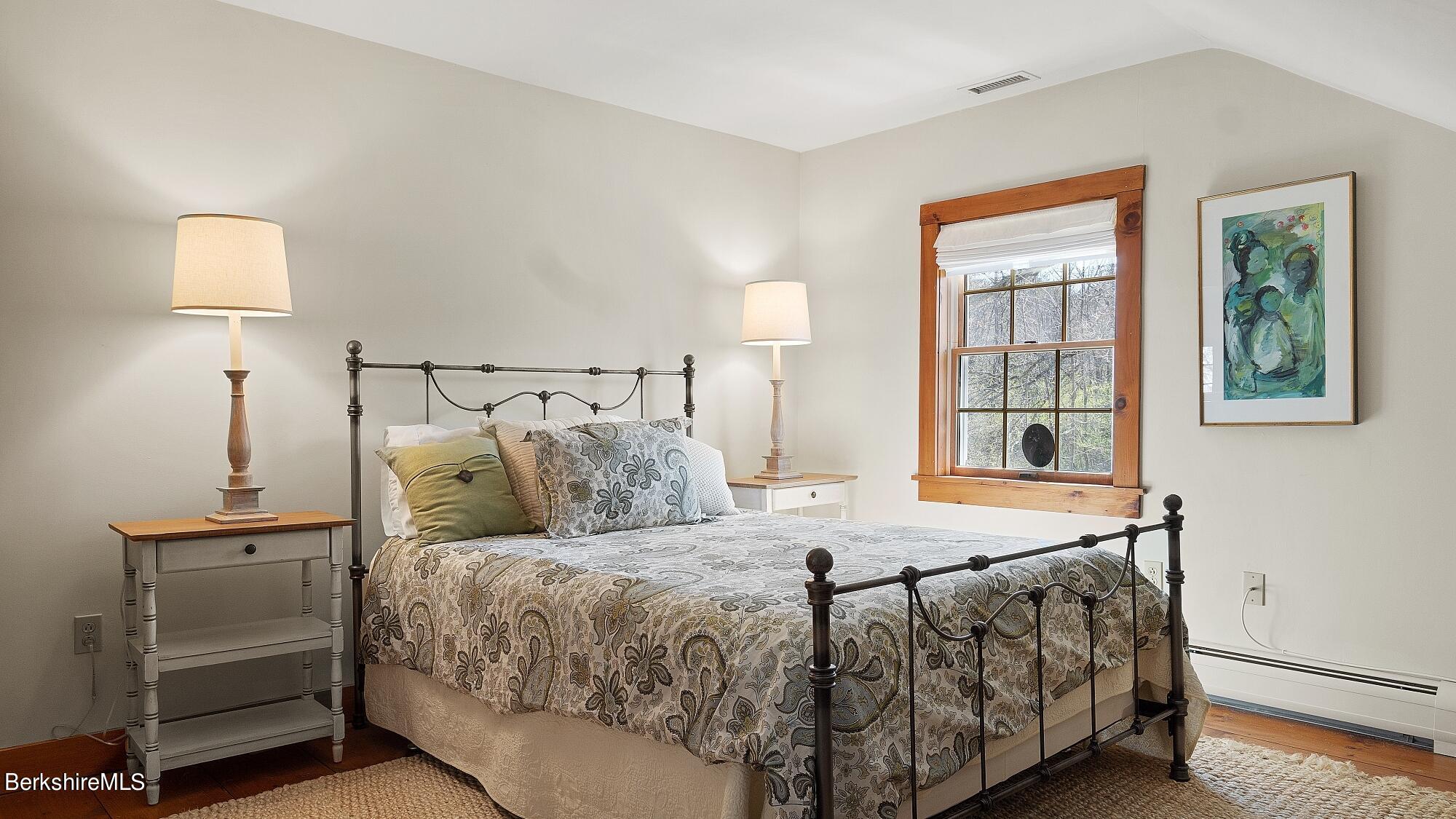 2 Hill Road Stockbridge, MA 01266 - Photo 16 of 24 a bedroom with a bed and a night stand