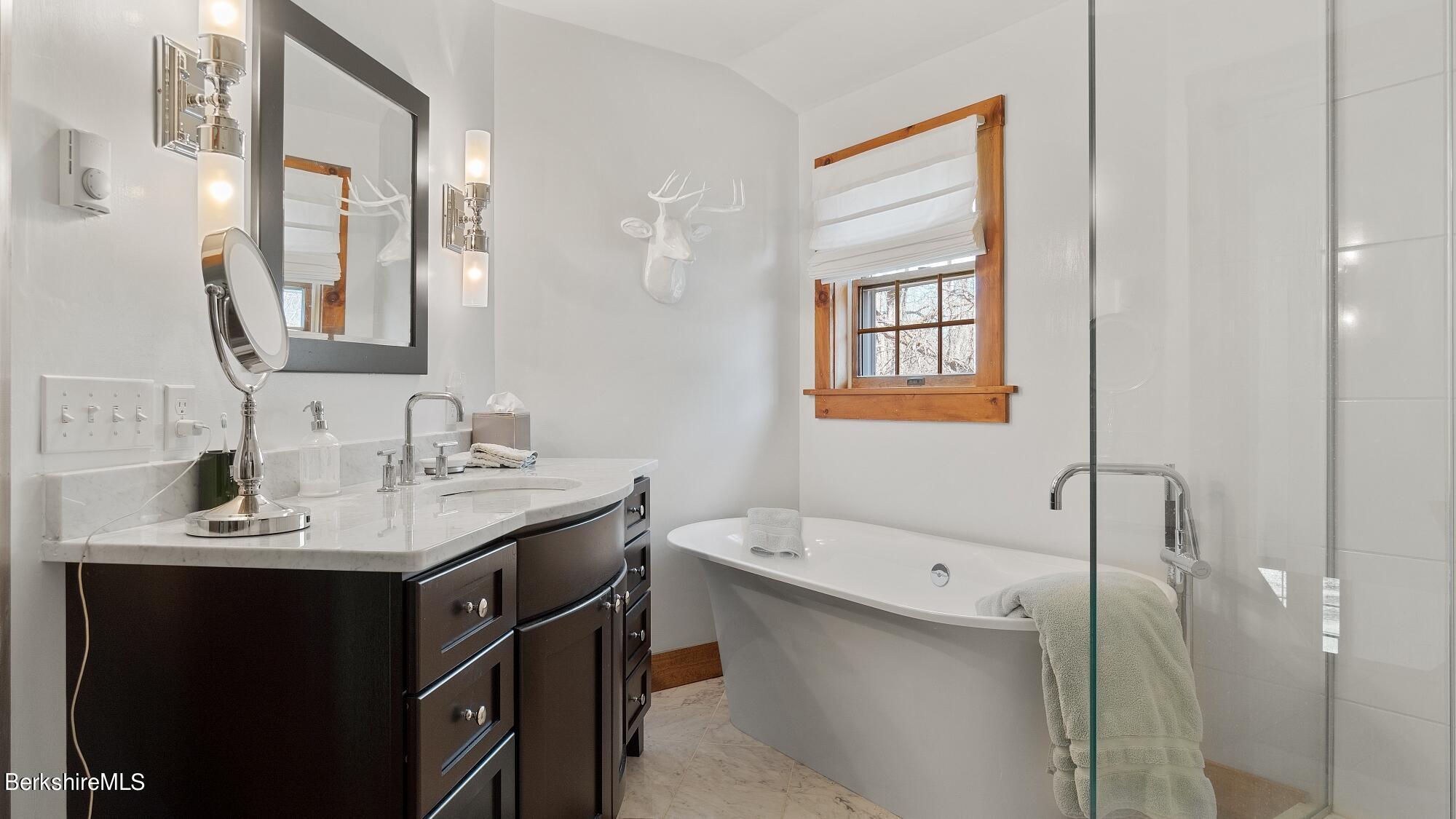 2 Hill Road Stockbridge, MA 01266 - Photo 18 of 24 a bathroom with a sink double vanity granite tub and shower
