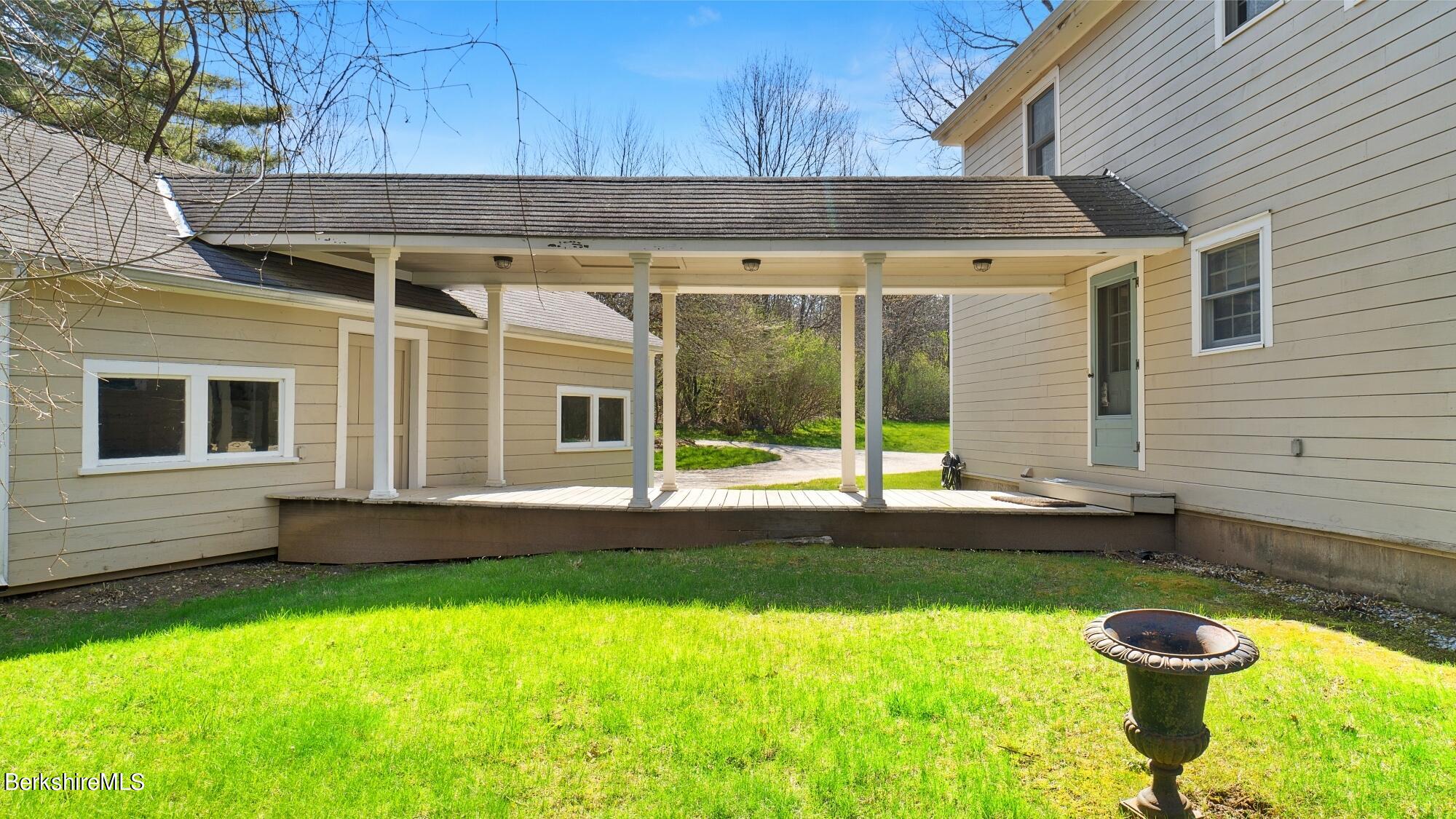 2 Hill Road Stockbridge, MA 01266 - Photo 21 of 24 a view of a house with a yard and sitting area