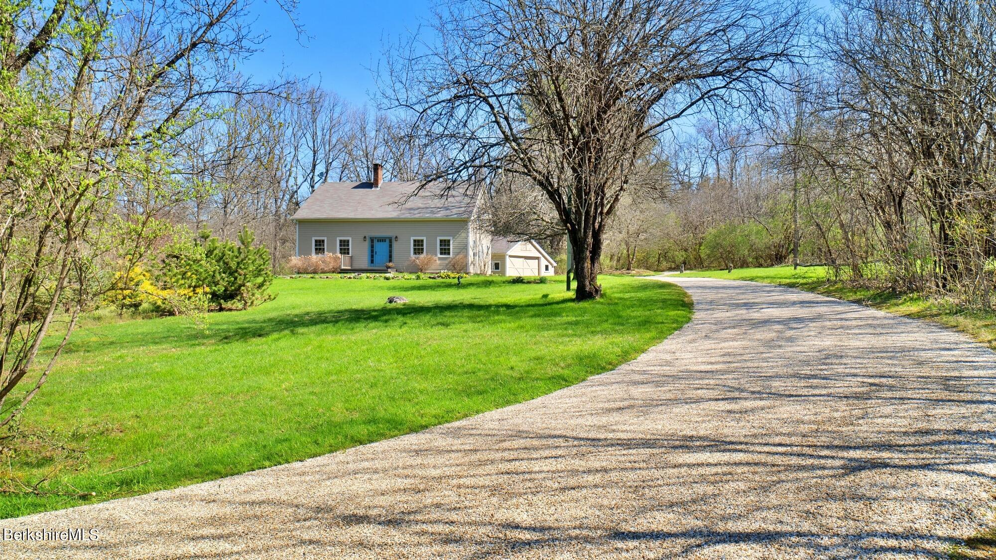 2 Hill Road Stockbridge, MA 01266 - Photo 22 of 24 a front view of house with yard and green space