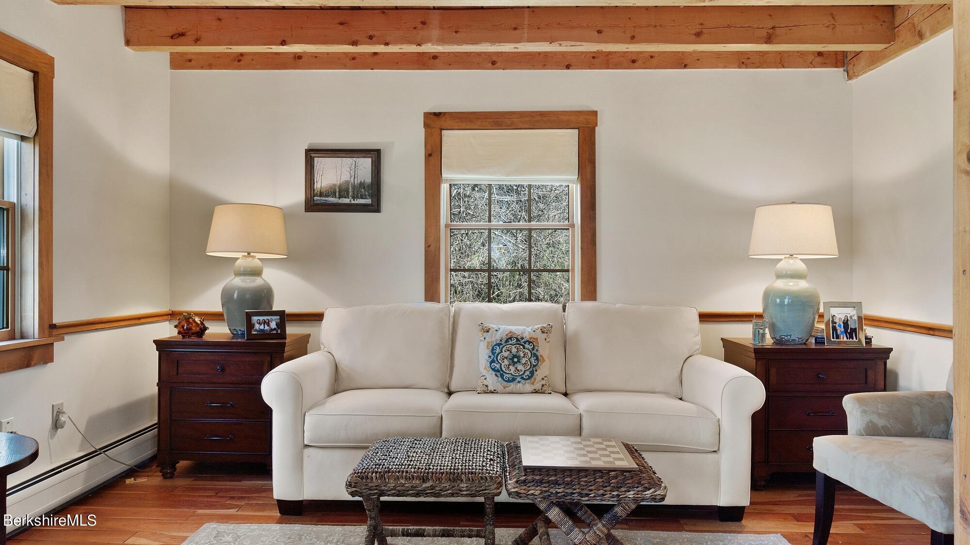 2 Hill Road Stockbridge, MA 01266 - Photo 7 of 24 a living room with furniture and a lamp