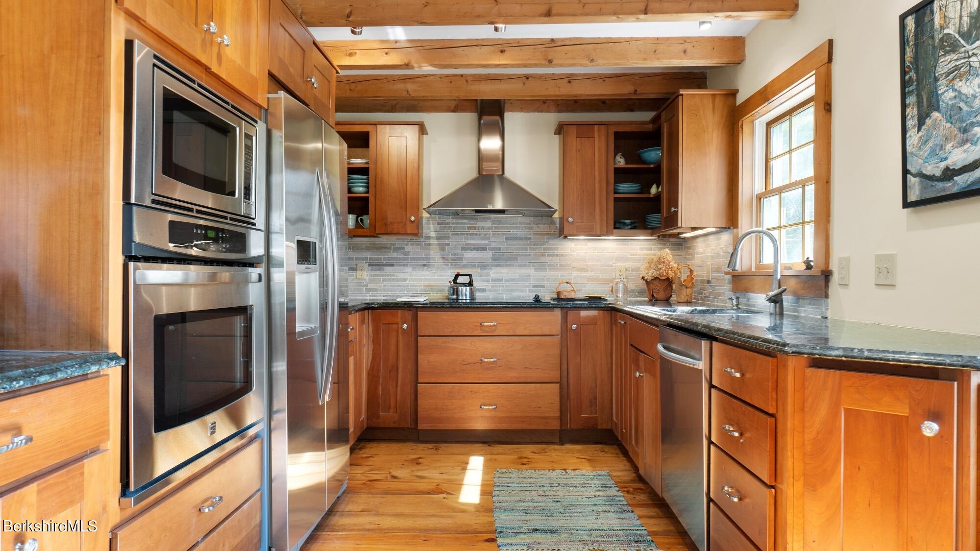 2 Hill Road Stockbridge, MA 01266 - Photo 9 of 24 a kitchen with stainless steel appliances granite countertop a refrigerator and a sink