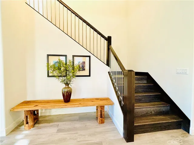 a bed room with a bed and a dresser