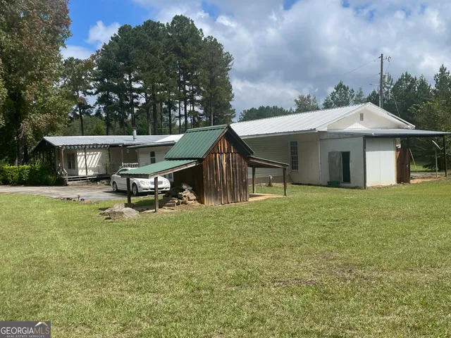 a house view with a garden space