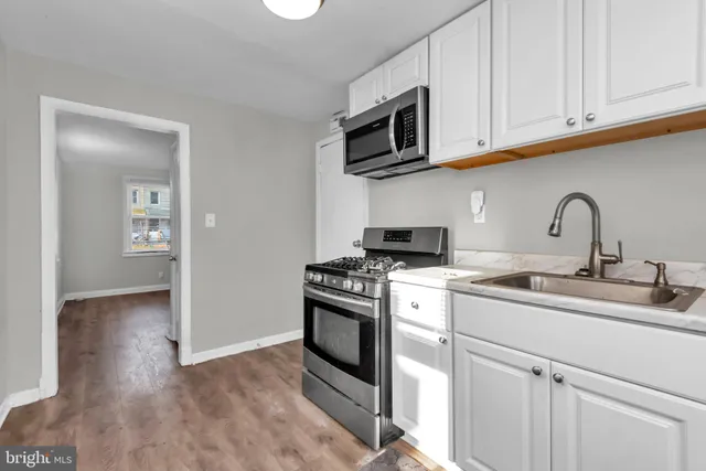 a living room with chairs