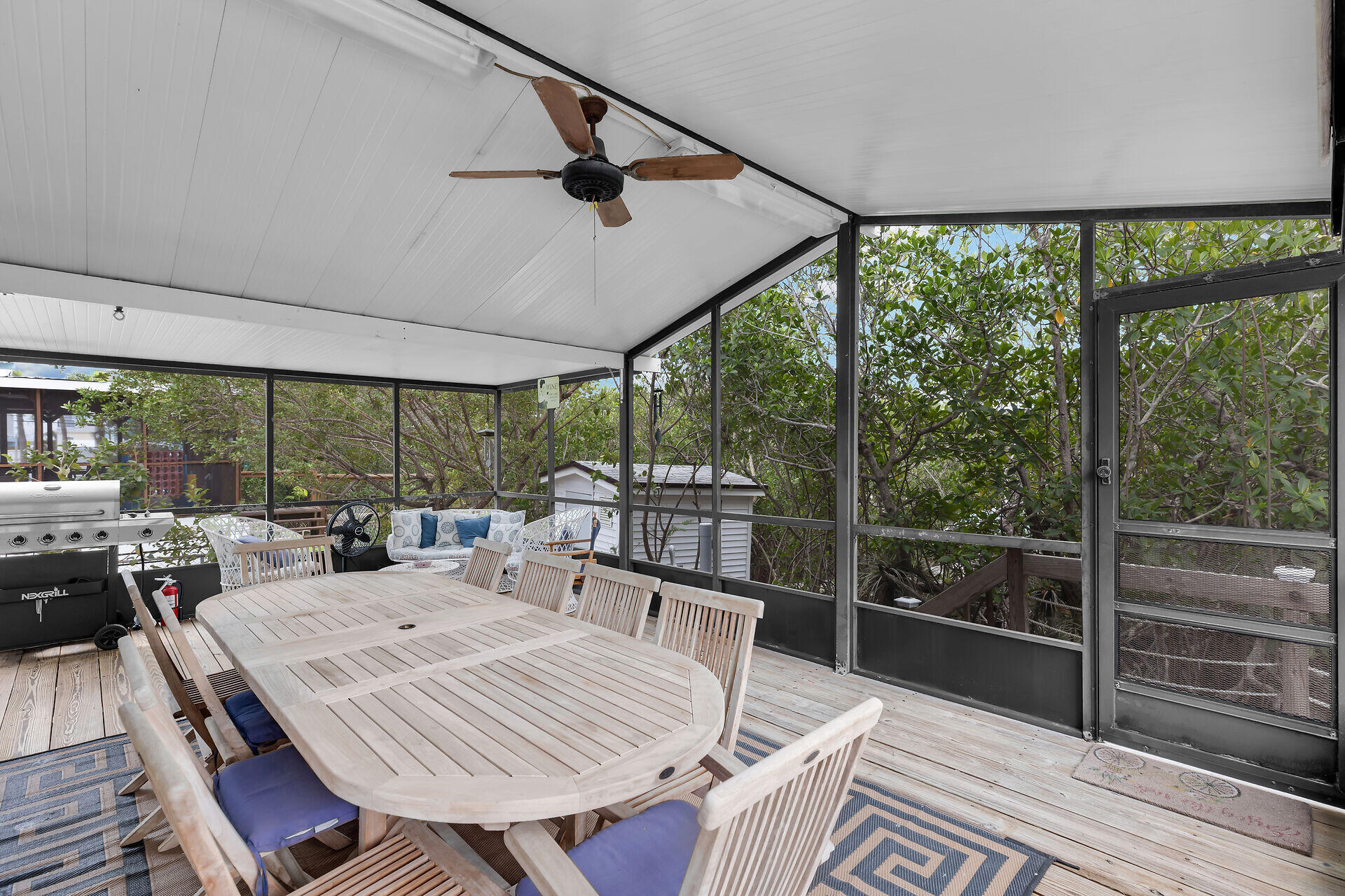 754 Michael Drive Key Largo, FL 33037 - Photo 4 of 23 a view of a dining room with furniture window and outside view