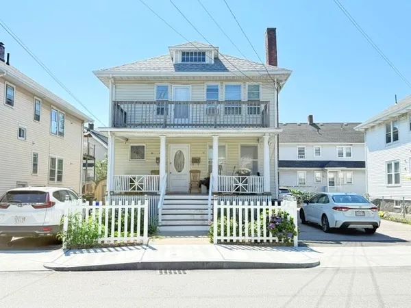 a front view of a house with a porch
