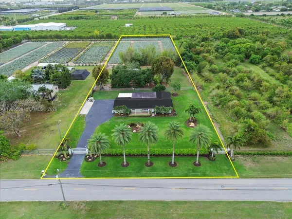 a view of a lake with a yard