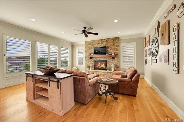a view of a livingroom with furniture and a fireplace
