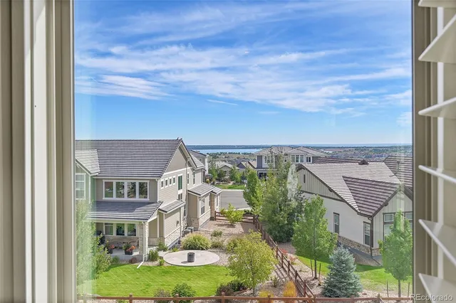 a spacious bedroom with a bed and a cabinets