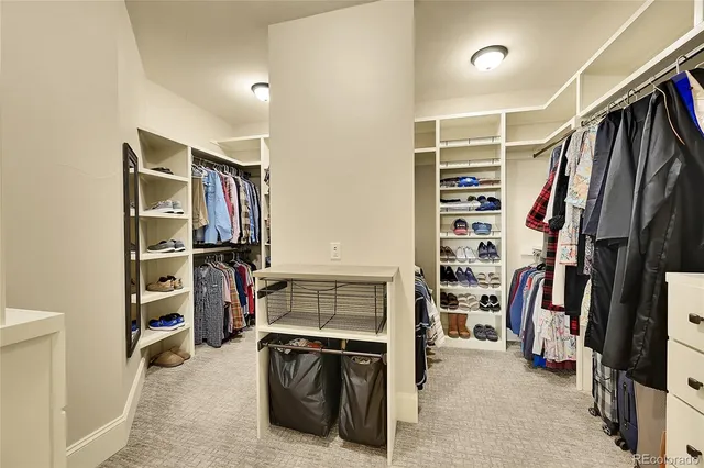 a bathroom with a sink a washer and dryer