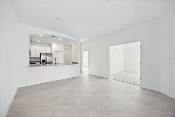 a view of a kitchen with a sink and a window
