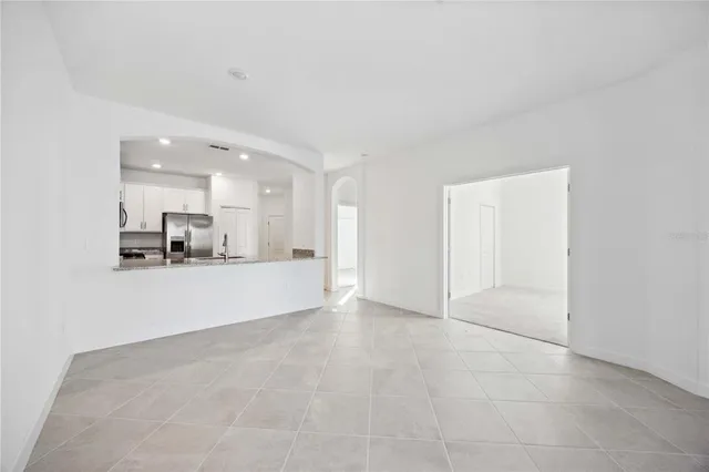 a view of a kitchen with a sink and a window