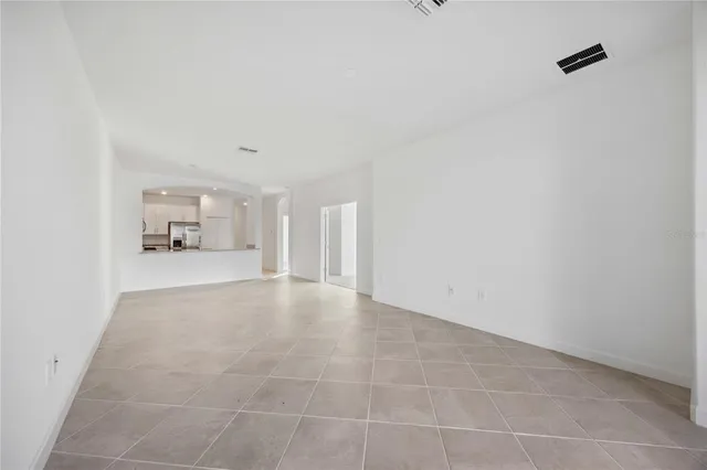 a view of empty room with a window