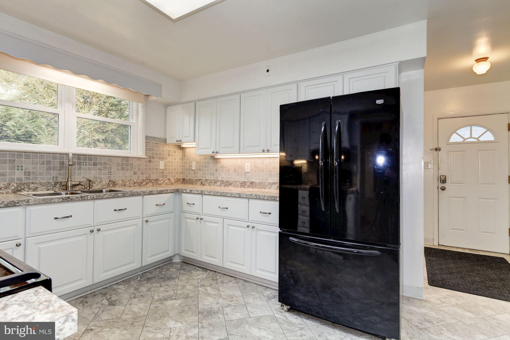 1906 Pot Spring Road Lutherville-Timonium, MD 21093 - Photo 11 of 30 Kitchen windows Look out to back yard.