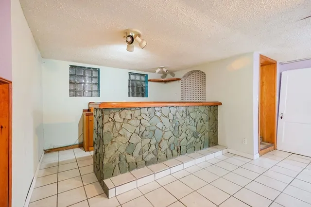 a view of balcony with wooden floor
