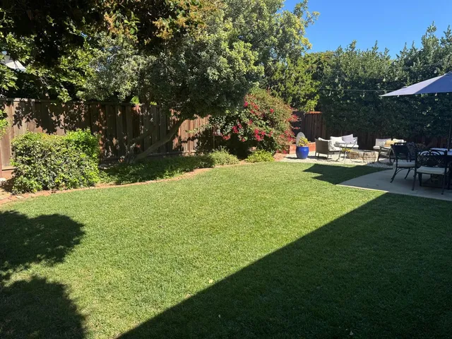 a view of a golf course with a garden