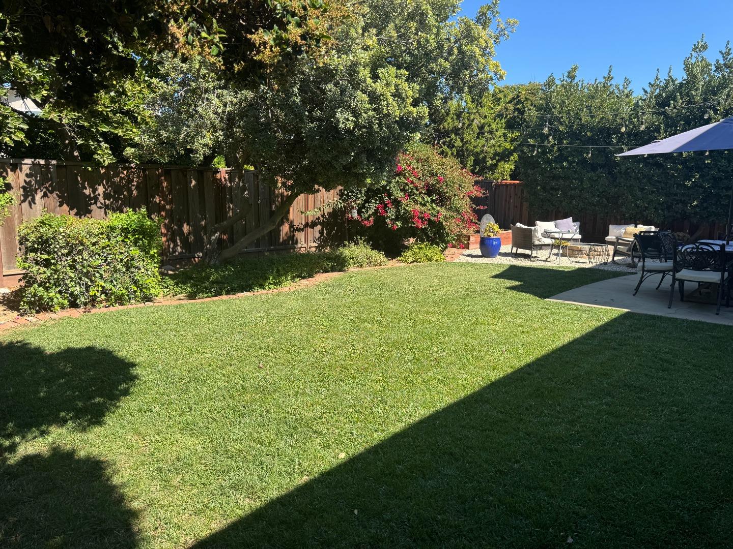 4460 Lahaina Way San Jose, CA 95118 - Photo 3 of 4 a view of a golf course with a garden